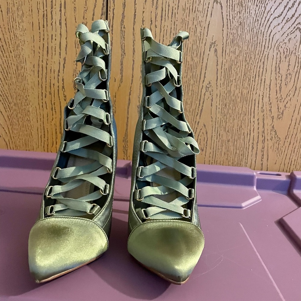 Green lace up heel boots, warn once